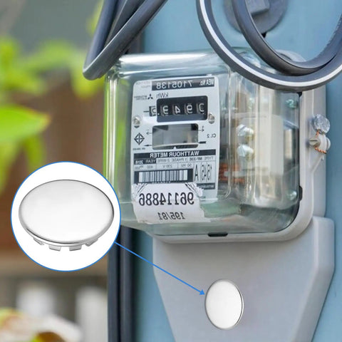 Twelve Pack Half Inch Round Stainless Steel Electrical Box Knockout Plugs For Dead Nuts Secure Panel Sealing and Unused Outlet Closure Trade Grade Heavy Duty Hole Plugs That Lock Tight With No Sweat Setup For Pro Wiring Jobs shown next to a power meter.