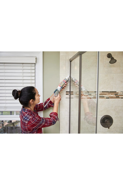 Person applying Advanced Silicone Kitchen And Bath Sealant In Almond Color For Easy DIY No Mess Caulking in a bathroom