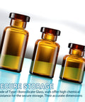 Amber glass vials with black aluminum caps; set of three on blue surface