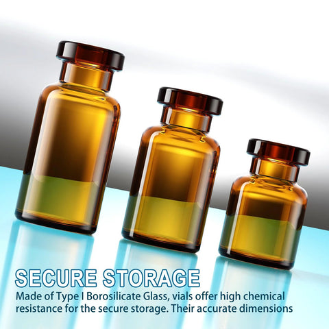 Amber glass vials with black aluminum caps; set of three on blue surface