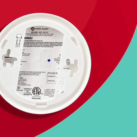 Back view of Combo Smoke And Carbon Monoxide Detector With Voice Alerts And Location Battery Operated White Dual Sensor Safety Alarm