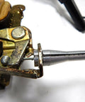 Close-up of Ford 16 Ends Latch Lock Cable Repair Kit for Vehicle Doors demonstrating a metal latch and cable connection.