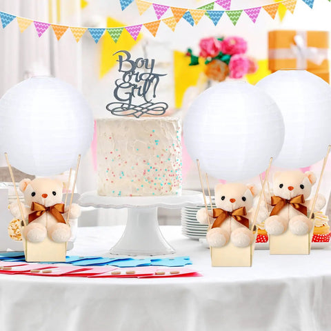 12 Sets Baby Shower Hot Air Balloon Table Centerpieces with white paper lanterns, plush bears, wooden baskets, and cake.