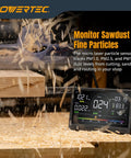 Badass 7 Inch Rechargeable Air Quality Monitor For Woodshops And Garages Monitoring Co2 Pm25 Pm10 Hcho Tvoc With Sharp Color Lcd Screen and Loud Safety Alerts on a workbench with sawdust.