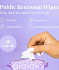 Hand using wipe from purple pack marked '20 count' as part of Menstrual Disc Starter Kit With Medical Grade Silicone All Inclusive Set.
