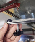 Heavy Duty Fire Sprinkler Shut Off Tool That Works Like A Champ To Halt Accidental Sprays And Slash Water Damage Costs On Any Commercial Job Site Today, held in hand.