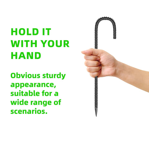 Hand holding a 12 inch black galvanized steel J-shape hook from Heavy Duty Set Of 20 12 Inch Garden Ground Stakes Galvanized Steel J Shape Hooks Rebar Anchors For Tents, Fences, Trampolines, And Outdoor Landscaping Projects And More.