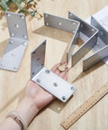 Beefy Heavy Duty L Brackets 4 Pack Solid Steel Right Angle Corner Brackets displayed with a ruler and hand for scale, silver