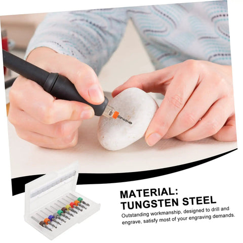 Hands using 30 Piece Tungsten PCB Drill Bit Set for Hand Drill and Jewelry Making on a stone, tungsten steel bits visible.