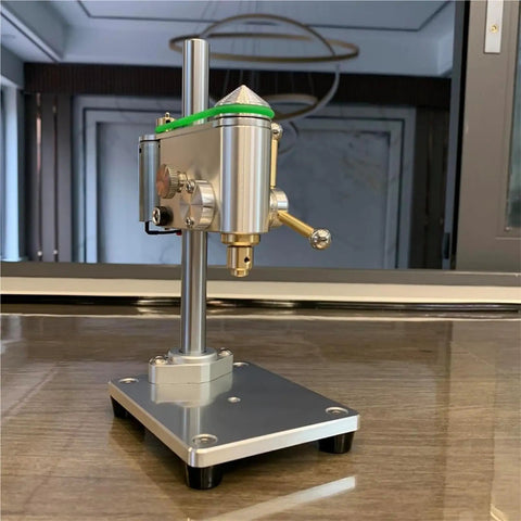 Industrial Grade Mini Bench Drill Press With Precision Variable Speed Control, compact aluminum alloy body on a tabletop.