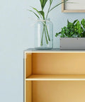 Bookshelf with 16 Pcs PVC Corner Protectors for furniture, clear edge guards installed on top for safety.