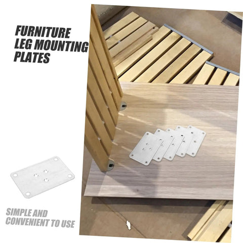 Solid As A Rock Heavy Duty Iron Furniture Leg Conversion Brackets For Couches And Tables shown on wooden floor with mounting plates.