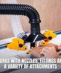 Two And A Quarter Inch Dust Collection Flexible Hose Kit with nozzles and screw end fittings attached to a workshop tool.