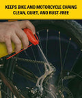 Person using All In One Rust Defense Spray T240 on bicycle chain from 11 oz aerosol can
