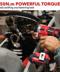 Person using 20V Max Lithium Ion Impact Driver With One Quarter Inch Quick Connect Chuck, 0 To 2900 RPM, for motorcycle repair