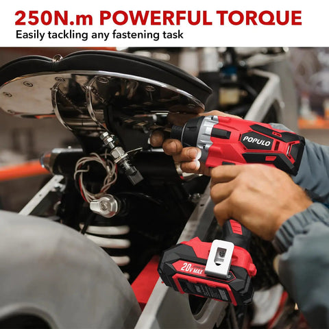 Person using 20V Max Lithium Ion Impact Driver With One Quarter Inch Quick Connect Chuck, 0 To 2900 RPM, for motorcycle repair