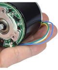 Cool 12V Brushless Motor With Big Neodymium Mag For Industrial Or DIY Work captured in a hand showcasing its circuit board and wires.