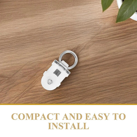 Compact white double wheel roller pulley for curtain tracks, part of 30 Pack Double Wheel Curtain Track Rollers With Rock Solid Alloy Plastic Pulleys Providing A Smooth Operator Glide Experience For Quick Curtain Upgrades And Effortless Sliding Window Track Fixes.