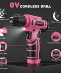 157 Piece Pink Cordless Drill Tool Set With LED Light And Variable Speed showing control trigger and soft grip handle.