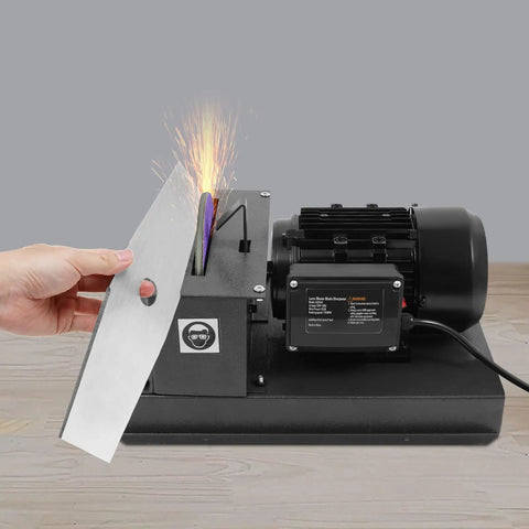 Heavy Duty Bench Mount Lawn Mower Blade Sharpener with 7 Inch Ceramic Grinding Wheel and electric motor in use.