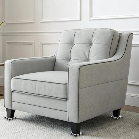 Gray armchair on carpet showing use of 8 Pack Carpet Furniture Sliders For Heavy Furniture On Carpet Heavy Duty Square Sliders 1.97x0.31 In Reusable Moving Pads