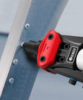 Boss Level Heavy Duty Manual Pop Rivet Gun Kit Featuring 200 Rugged Aluminum Rivets Plus Five Swap Out Nozzles, close-up on rivet application.
