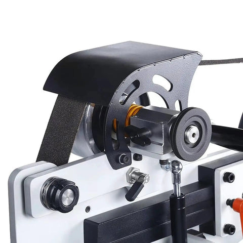 Close-up of the Shop Ready Variable Speed Belt Sander Grinder With Three Polishing Discs for detailed work mechanisms.