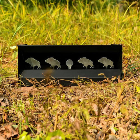 Portable Full Metal Quad Hog Target Set for Pellet and BB Guns with four hog silhouettes and center ring in grass.