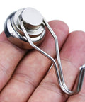 Heavy Duty Magnetic Hooks Rocking Killer Hold And Smooth Swivel Design To Supercharge Your Garage Organization While Delivering Dead Reliable Strength And Zero Fuss Daily Setup in hand, showcasing stainless steel construction.