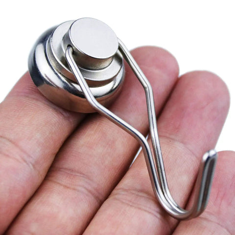 Heavy Duty Magnetic Hooks Rocking Killer Hold And Smooth Swivel Design To Supercharge Your Garage Organization While Delivering Dead Reliable Strength And Zero Fuss Daily Setup in hand, showcasing stainless steel construction.