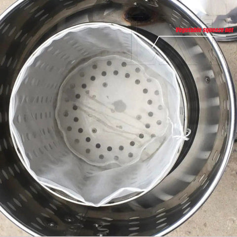 Inside view of the slick stainless steel vegetable water extractor with rust-proof mesh bowl for quick drying.