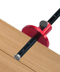 Close-up of Heavy Duty Rock Solid Adjustable Wheel Marking Gauge For Woodworking Precision Scriber on wood with knurled knob.