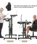 Rolling Standing Desk On Wheels With Height Adjustment for sitting and standing, 23.6 x 23.6 inch workspace in a home office setup.