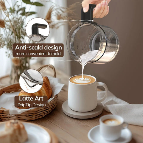 All In One Electric Milk Frother And Steamer For Latte And Hot Chocolate With Boss Froth In Minutes being poured into a mug