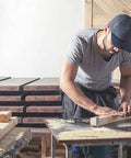Person crafting wood piece using Pro Grade Top Bearing Flush Trim Router Bit Set Of 4 With 1/4 Inch Shank Cut To Heights Of 1/4, 5/16, 3/8 And 1/2 Inch For Veneer And Shelf Edge Trimming And Flush Finishing.
