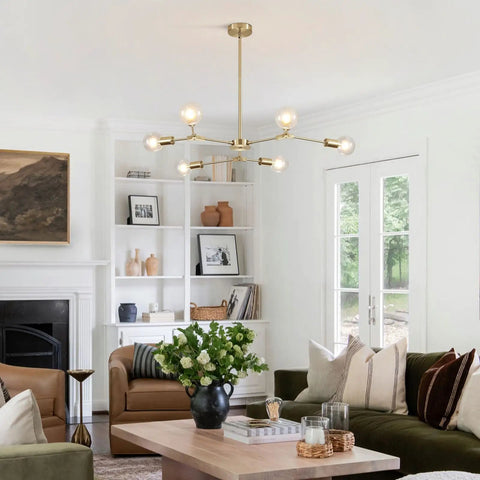 Modern Sputnik Chandelier In Brushed Brass With Six Light Gold Finish Hanging Pendant Above Living Room Seating Area