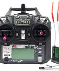 Front view of 10 Channel 2.4GHz RC Transmitter with FS-iA10B Receiver and upgrade cable for helicopters, planes, and more.