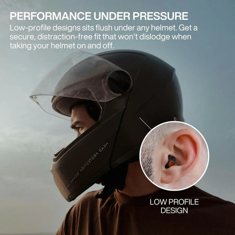 Rider wearing helmet with Moto Pro Motorcycle Ear Plugs For Wind Noise Reduction With High Fidelity Filter Reusable Ear Plugs