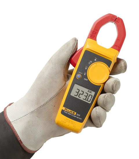 Hand holding Pro Grade Clamp Meter For Electricians With True RMS Readings, Measures AC Current To 400 A, AC And DC Voltage