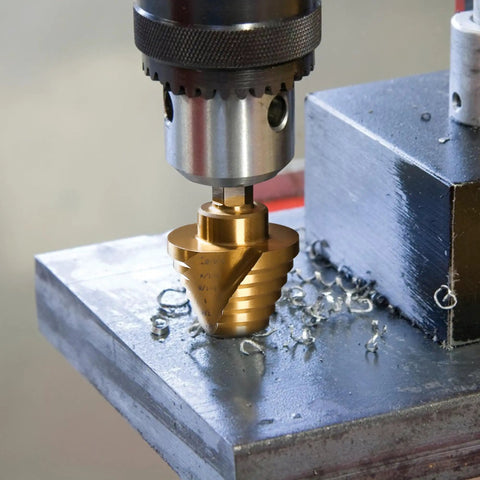 Top Shelf Five Piece Titanium HSS Step Drill Bit Set With Spiral Dual Flute Design And 118 Degree Split Tip For Quick Self Centering Metal Work That Cruises Through Mild Steel Without Walking Or Chip Jamming On Your Weekend Grind