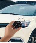 Durable CNC Aluminum Hood Lock Kit in hand with car background, Ideal for cars, trucks, and SUVs, easy install, secure fit.