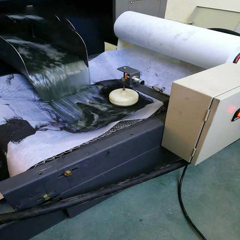 Heavy Duty Cutting Fluid Filter Paper Roll Straight Up Tough For Grinders And Machine Shops Top Shelf Mixed Fiber Oil Filtration 100Cm By 100M Industrial Workhorse in use with coolant flowing over.