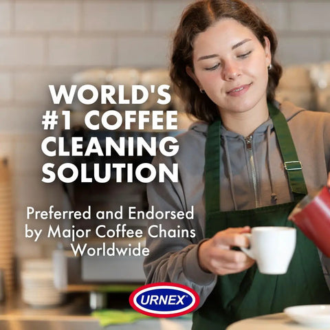 Barista holding coffee cup with sign 'World's #1 Coffee Cleaning Solution', promoting Pro Grade Coffee Grinder Cleaning Tablets 430 Grams.