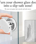 Two Piece Suction Cup Handle Set for shower glass doors, silver finish, no-drill removable knob shown in hand, durable ABS plastic.