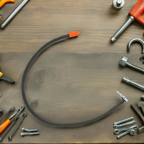 Solid As A Rock Metal High Pressure Tire Inflator Extension Hose Leakproof Design Universal Fitment For Your Car Or Bike To Stay Pressed Up No Drama With Wear Resistance To Handle Any Job Wherever You Are From Garage To Highway, black hose with orange and metal connectors on wood