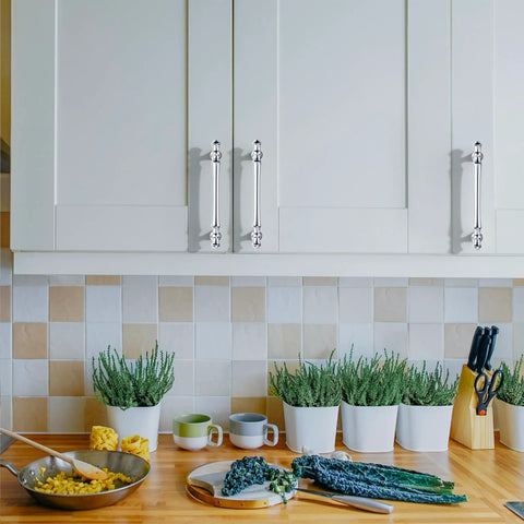 10 Pack 5 Inch Polished Chrome Kitchen Cabinet Handles And Drawer Pulls Set installed on white cupboard doors in kitchen setting