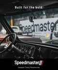 Interior view of a classic car dashboard with Speedmaster branding visible through the windshield, emphasizing quality parts.