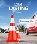Six Pack 28 Inch Traffic Safety Cones With Reflective Collars in use on road with cars for visibility