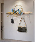 Heavy Duty Wall Mount Coat Hooks For Entryway And Closet, decorative metal rack with flowers, holding bags and umbrellas.