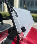 Top Tier Four Seater Electric Golf Cart Built With A Solid Front Bumper And Aggressive Off Road Tires Including HD LED Smart Dashboard showing a clear windshield mount.